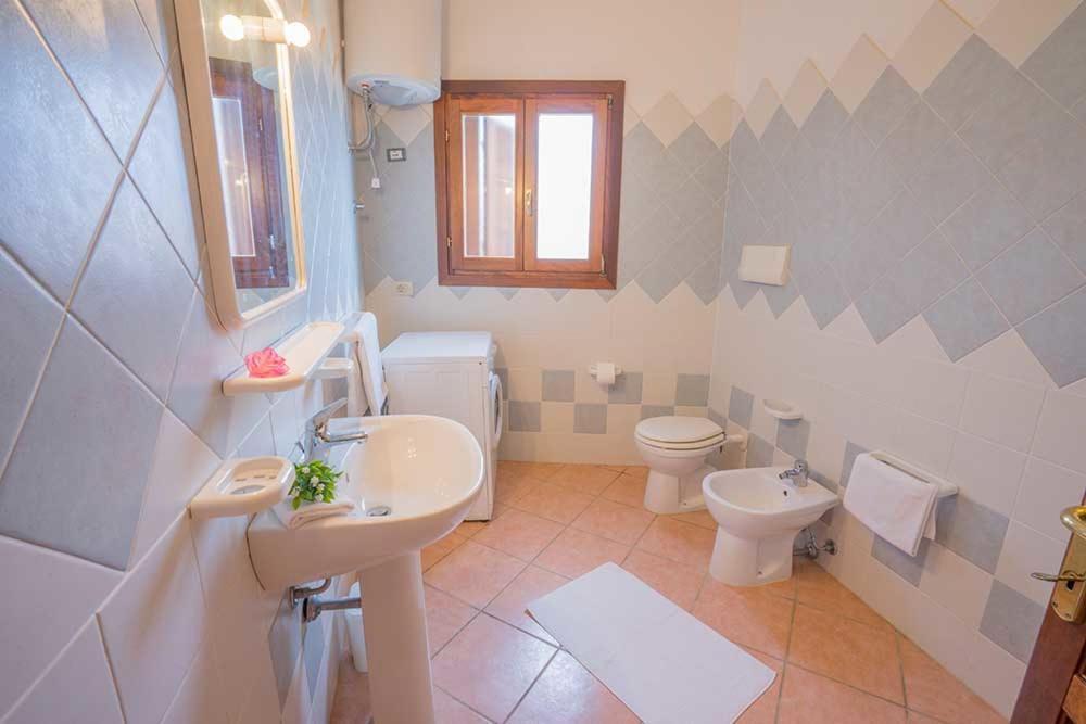 Residence Baia Sant Anna Con Piscina Tanaunella Kültér fotó