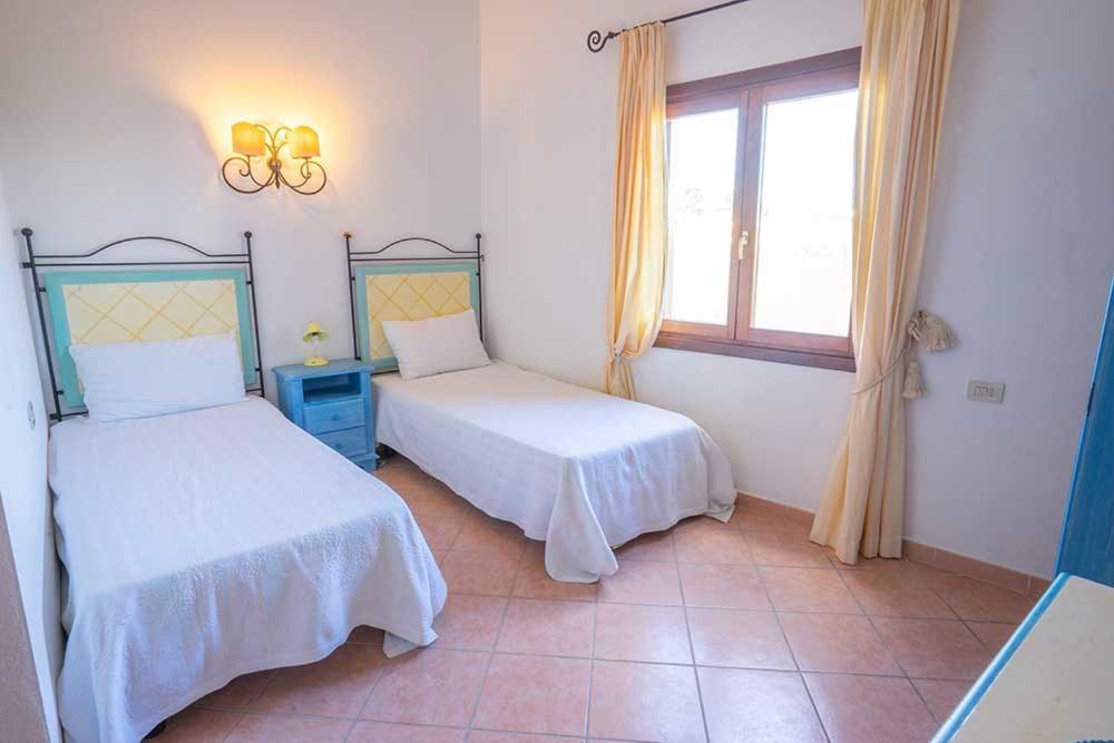 Residence Baia Sant Anna Con Piscina Tanaunella Kültér fotó
